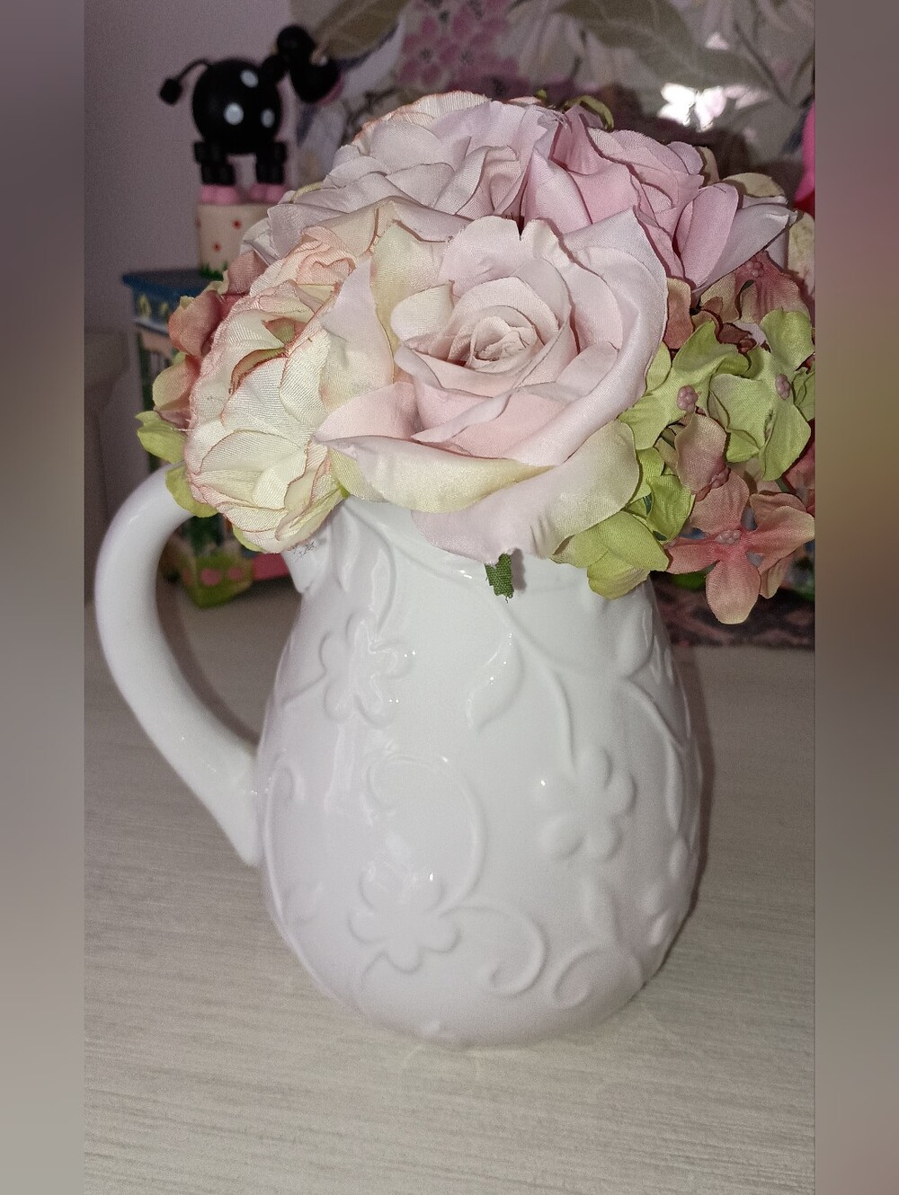 2/$20 White Embossed Ceramic Pitcher Vase with Pink Floral Arrangement